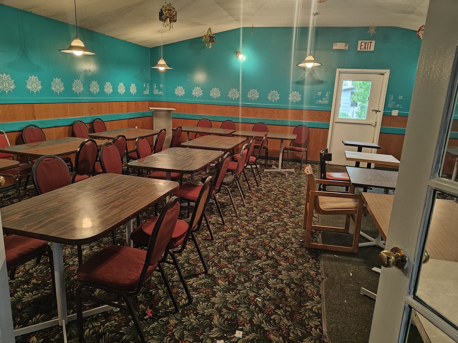 Dining room entrance and seating at Platania Tavern