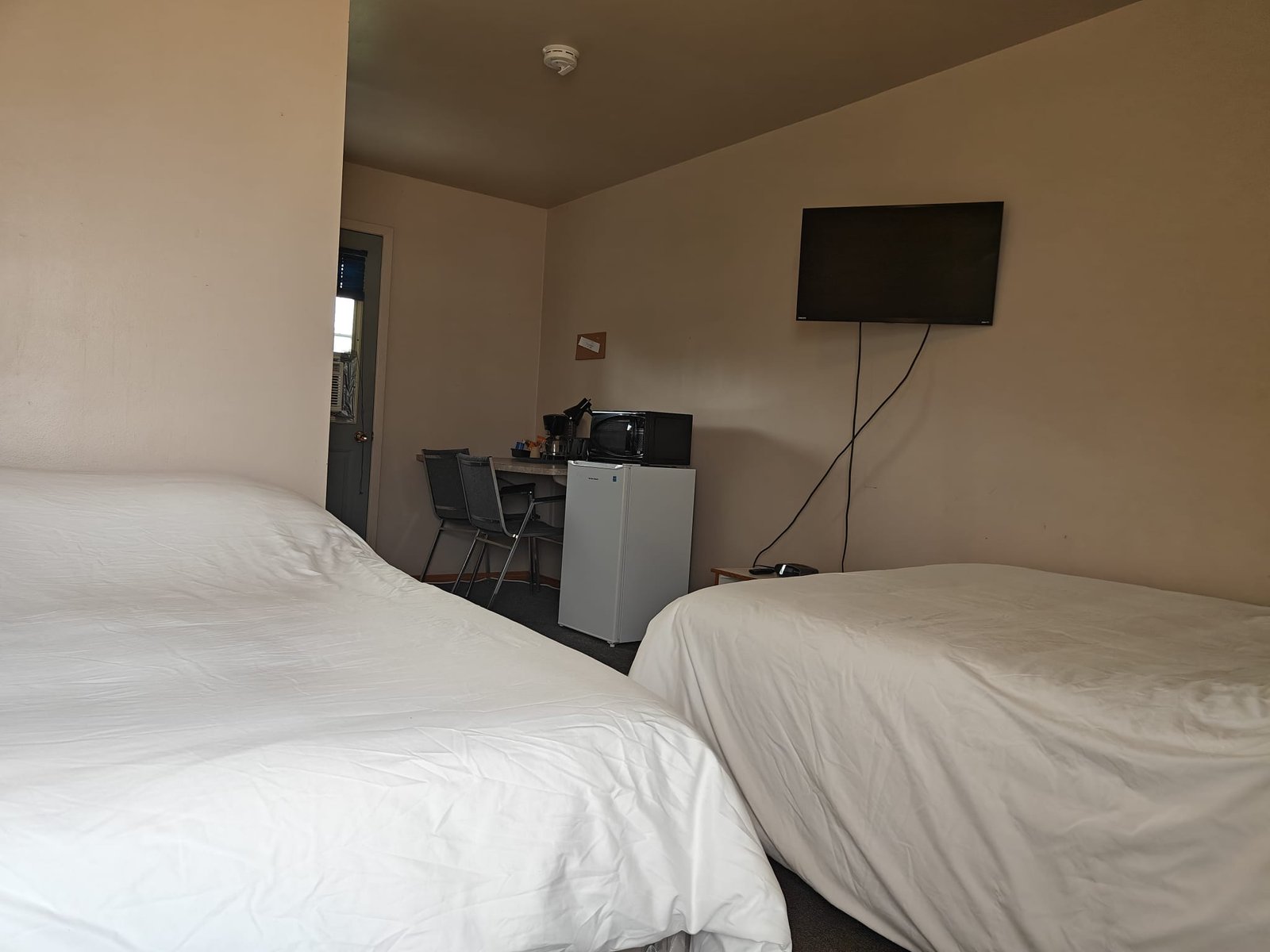 Sturgis Motel family room with TV and two beds
